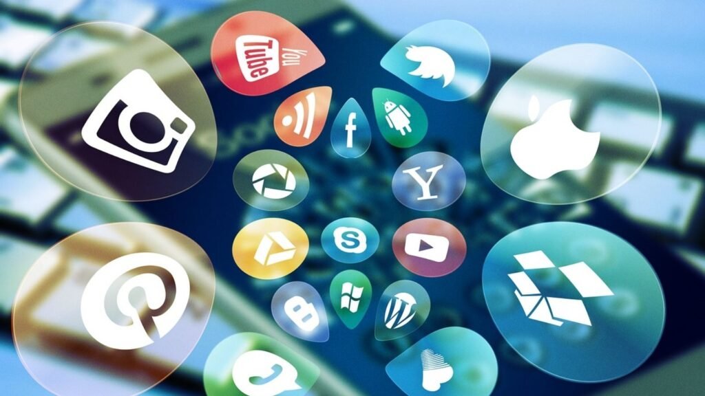 The Social Media Agency in Los Angeles Behind Fast-Growing Brands 2 Social media app icons hovering over smartphone screen with digital glow